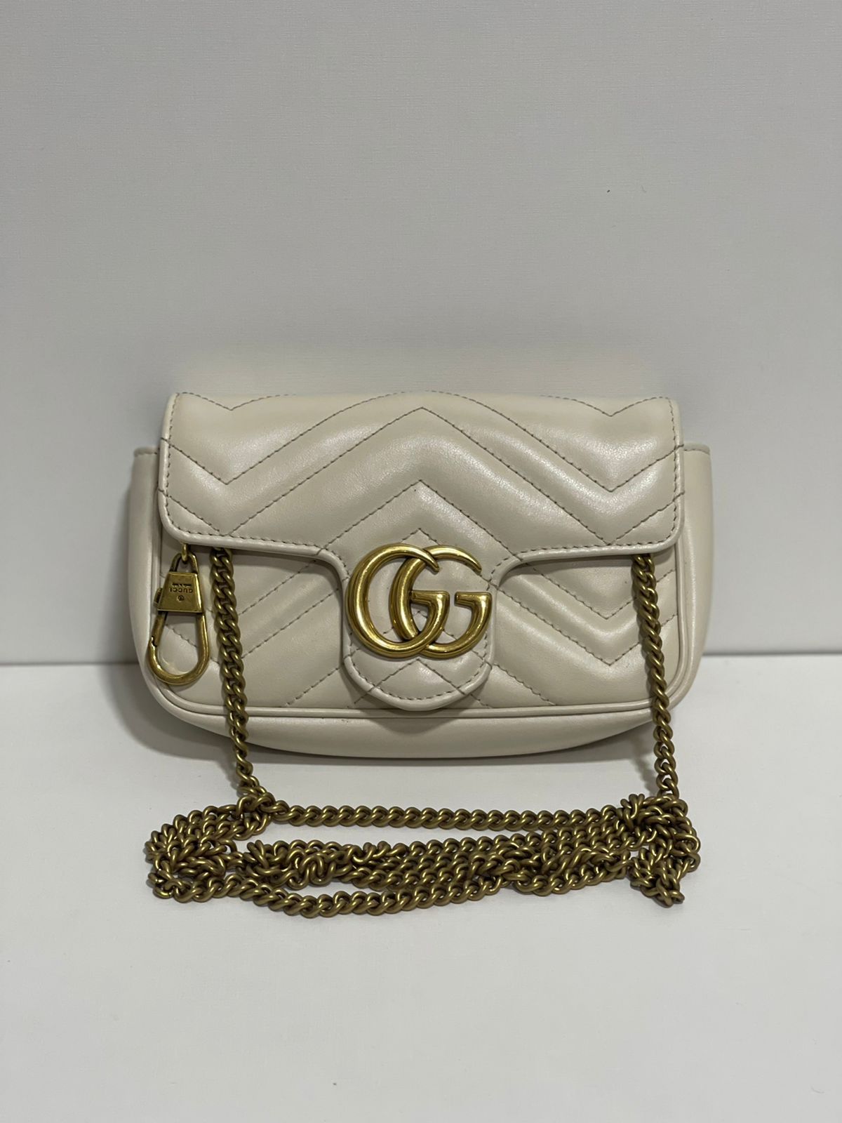 Bolsa Gucci Original transversal GG Marmont mini matelassê Feminino